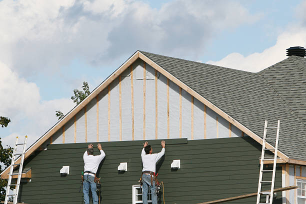 Professional Emergency Siding Repair technician working in Ada, MN